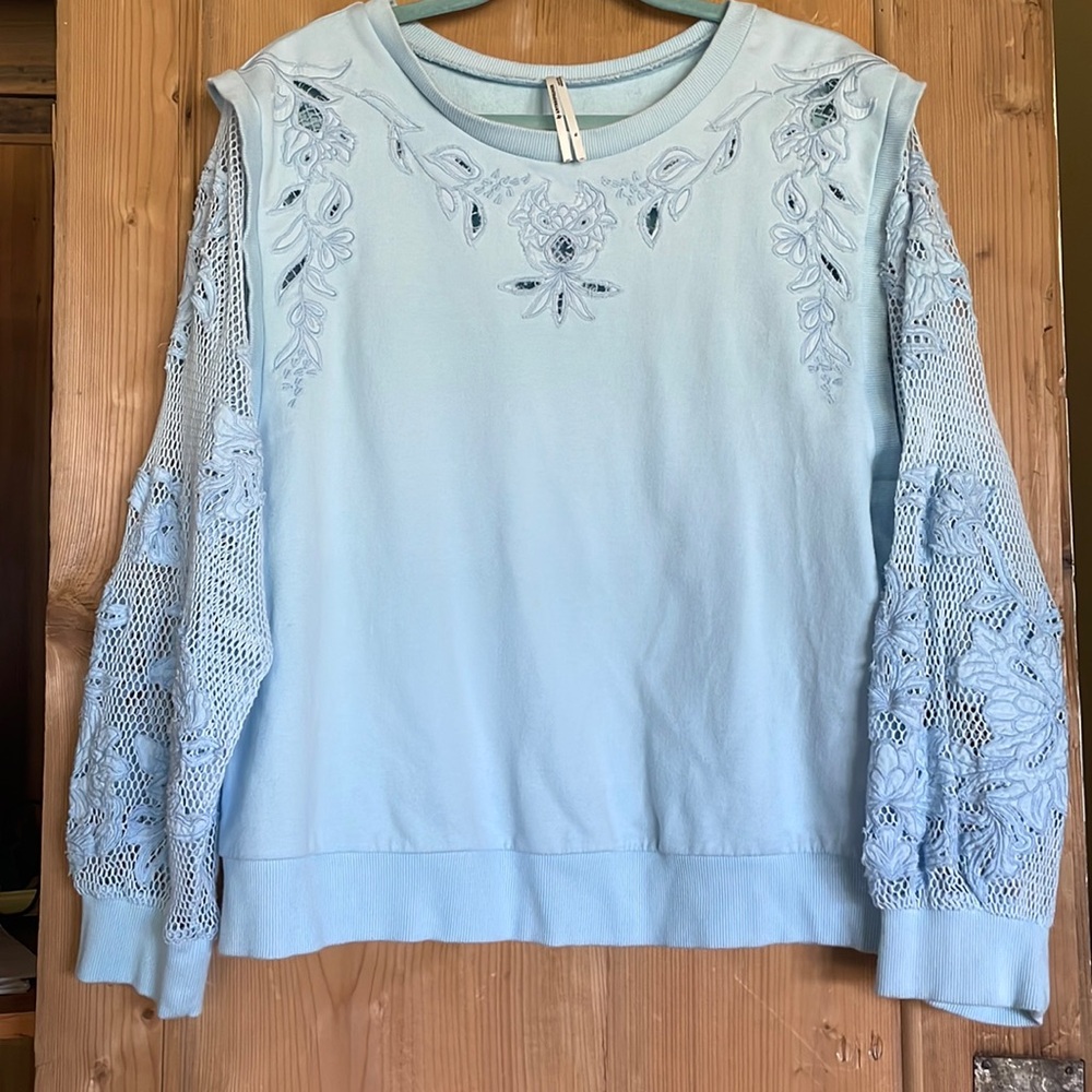 Anthropologie Brand Sweatshirt Size XL. Light Blue with lace sleeves.